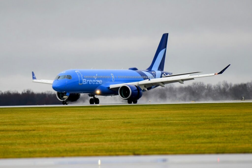 A Breeze Airways A220 lands at Akron-Canton Airport